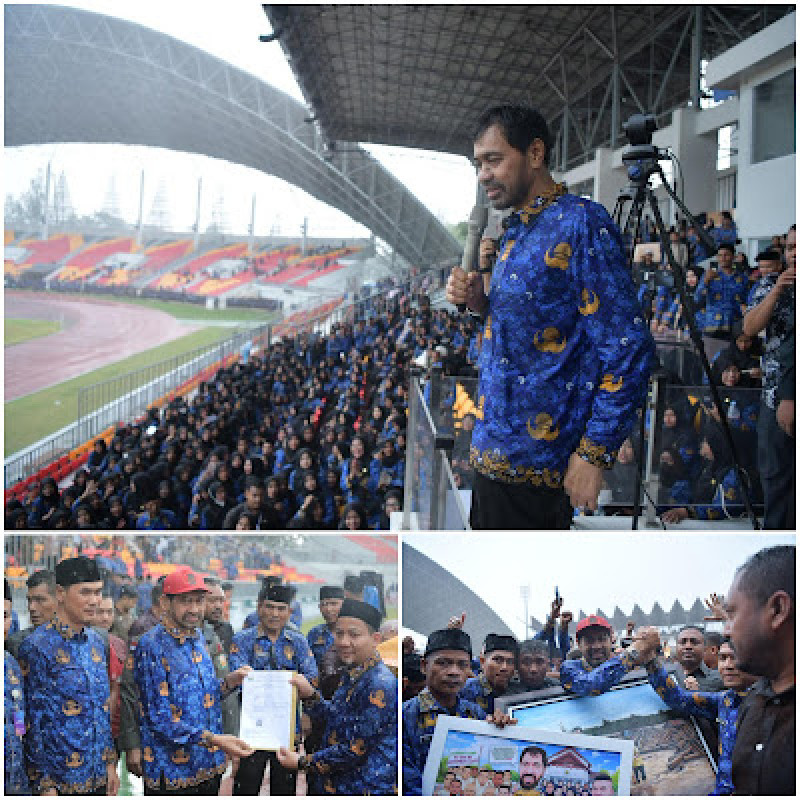 Di Tengah Hujan Deras, Mualem Serahkan SK PPPK Paruh Waktu kepada Ribuan Honorer